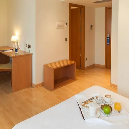 Exe Puerta San Pedro לוגו