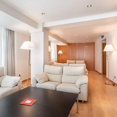 Exe Puerta San Pedro מלון לוגו