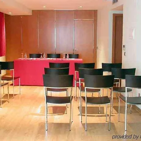 Exe Puerta San Pedro מלון לוגו