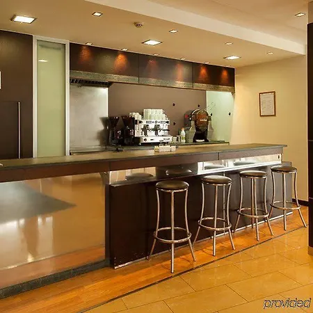 מלון Exe Puerta San Pedro לוגו