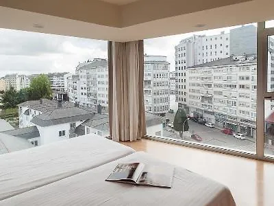 Exe Puerta San Pedro 3* לוגו