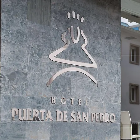 Exe Puerta San Pedro לוגו